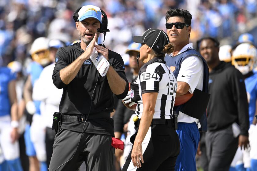 Los Angeles Chargers head coach Brandon Staley calls for a timeout during the second half of an NFL football game against the Tennessee Titans Sunday, Sept. 17, 2023, in Nashville, Tenn. (AP Photo/John Amis)