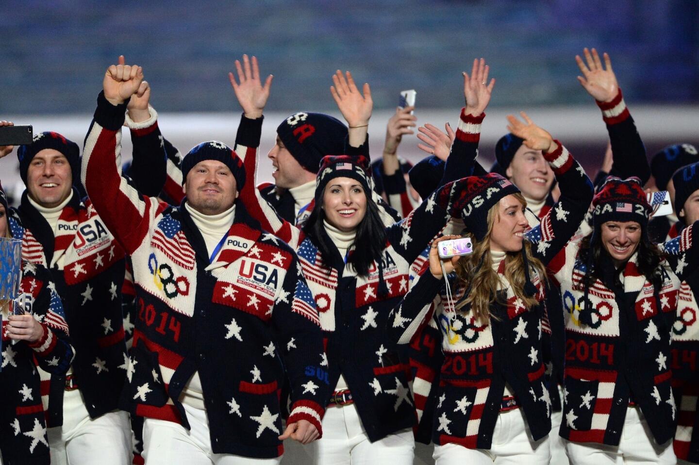 Olympic athletes from the United States wear sweaters designed by Ralph Lauren in the opening ceremony.