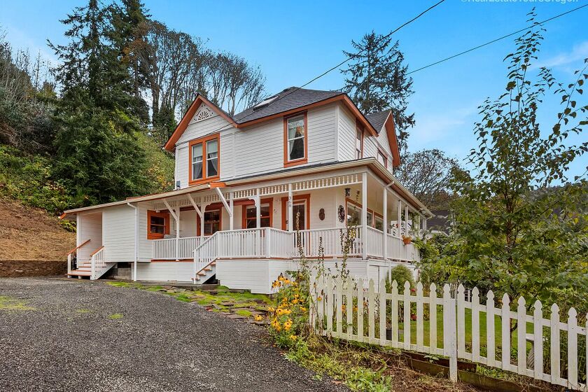 FILE - In this undated photo provided by RETO Media is the house featured in the Steven Spielberg film "The Goonies" in Astoria, Ore. The listing agent for the Victorian home said this week the likely new owner is a fan of the classic coming-of-age movie about friendships and treasure hunting, and he promises to preserve and protect the landmark. The 1896 home with sweeping views of the Columbia River flowing into the Pacific Ocean was listed in November with an asking price of nearly $1.7 million. (RETO Media via AP, File)