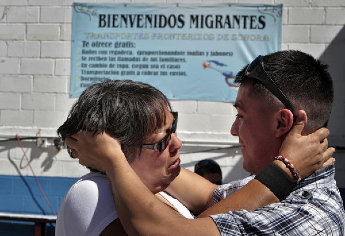 Jorge Arroyo, 19, tearfully greets his mother at a migrant shelter in Nogales, Mexico. She came to take him back home to live in Mexico City. The teenager said he was deported after a dozen years as an illegal immigrant.