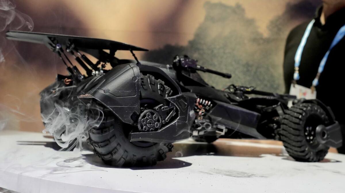 A toy Batmobile blows smoke out the back at the Mattel showroom at the 2017 Toy Fair in New York.