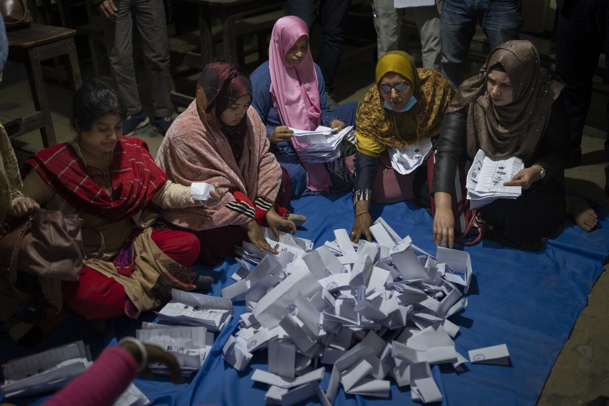 Polling officials count ballots in Bangladesh