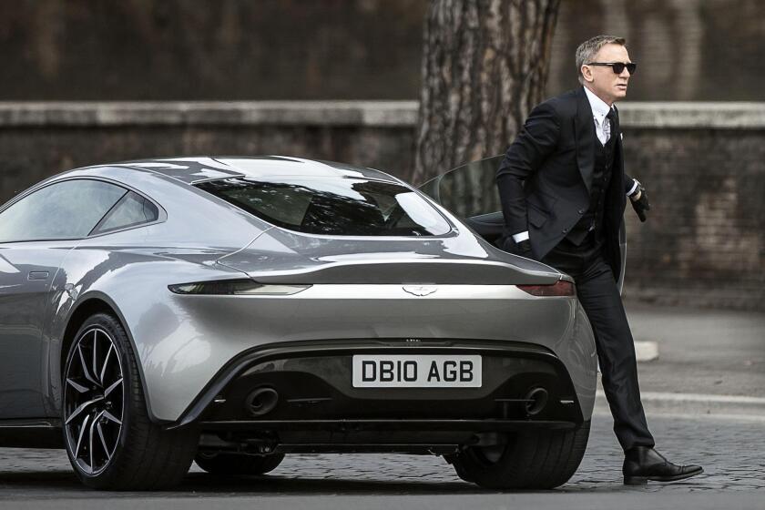 Daniel Craig on the "Spectre" set with an Aston Martin DB10. Craig was reportedly injured while shooting a scene for the new film.