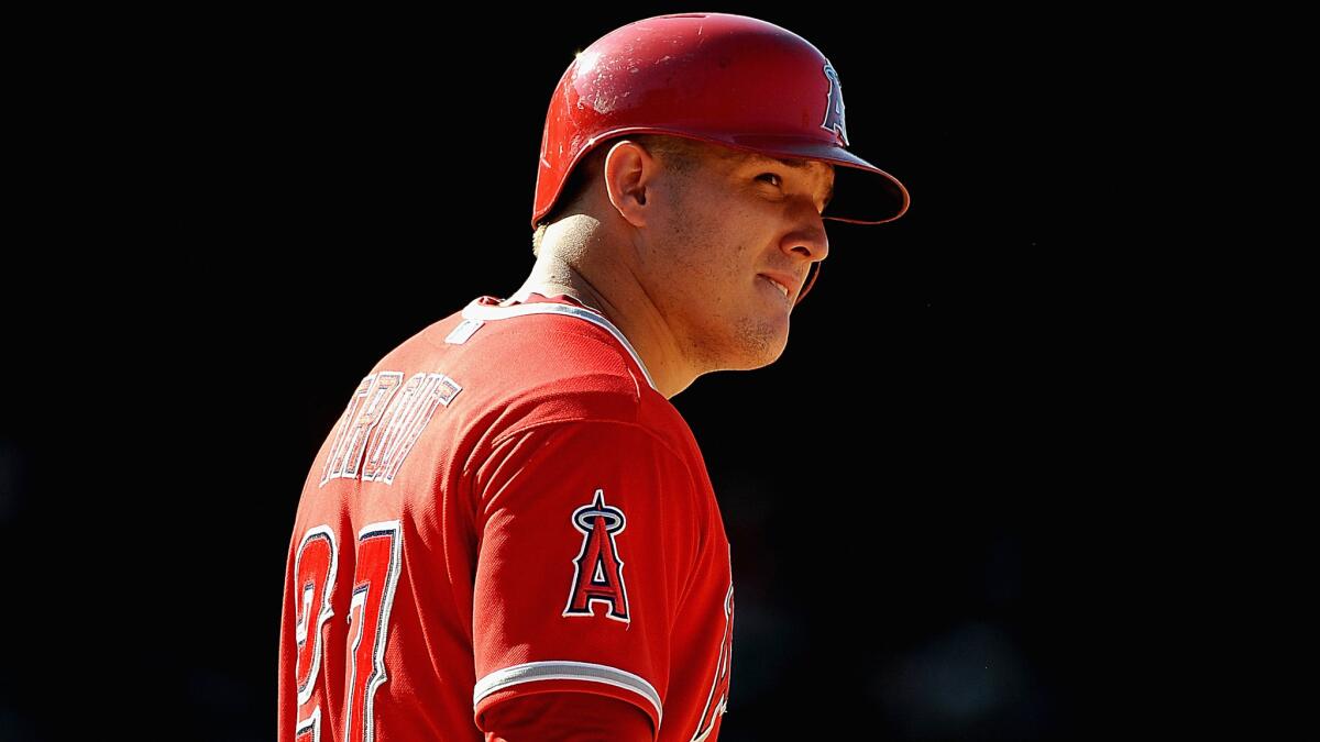 Center fielder Mike Trout, shown during a game against the Red Sox on July 20, is back in the Angels lineup one day after missing his first game because of injury.