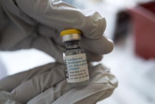 Registered pharmacist Sapana Patel holds a bottle of Monkeypox vaccine at a Pop-Up Monkeypox vaccination site on Wednesday, Aug. 3, 2022, in West Hollywood, Calif. With the arrival of additional JYNNEOS vaccination doses, the Los Angeles County Department of Public Health is expanding the criteria to include additional residents at high risk of exposure to monkeypox and launched a pop-up vaccination location in West Hollywood. (AP Photo/Richard Vogel)