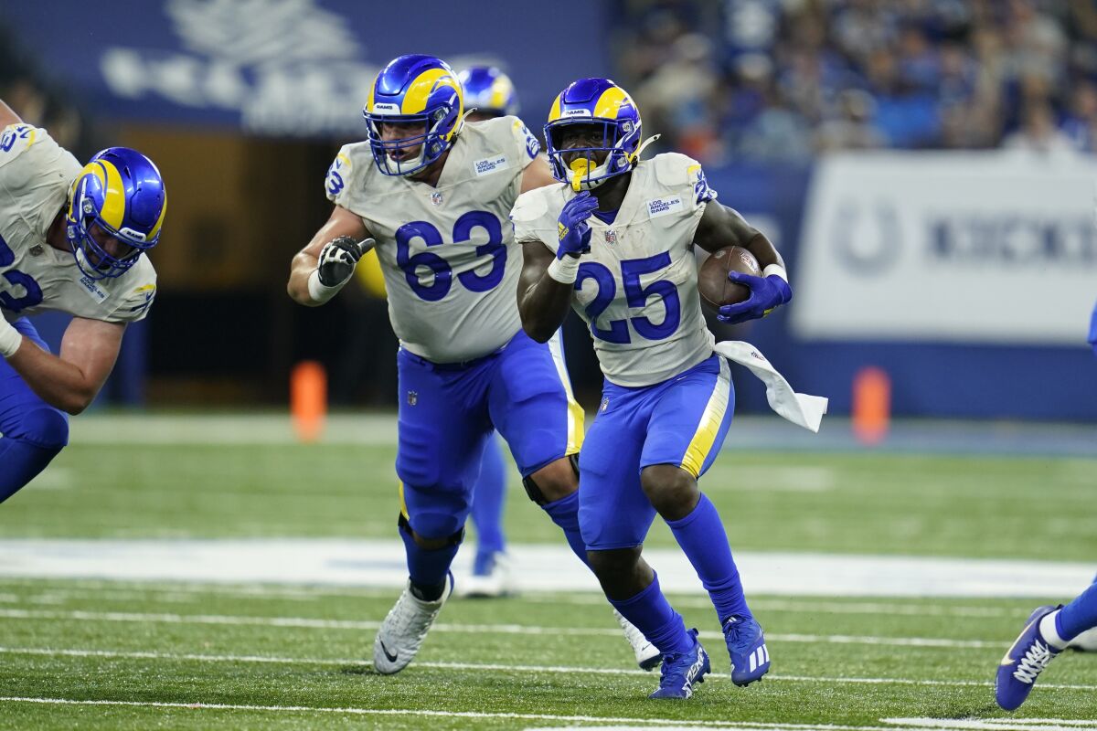 The Rams' Sony Michel (25) runs during the second half against the Colts.