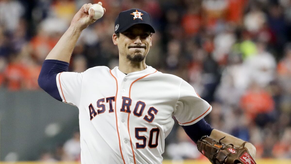 Charlie Morton throws against the Boston Red Sox during the first inning in Game 4 of a baseball American League Championship Series in Houston.