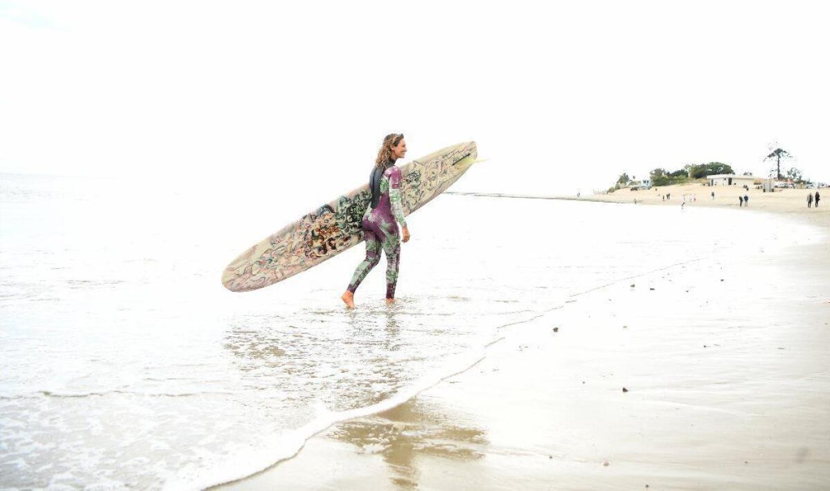Kassia Meador, seen here in Malibu, has helped lead the charge for equal pay in women's surfing.