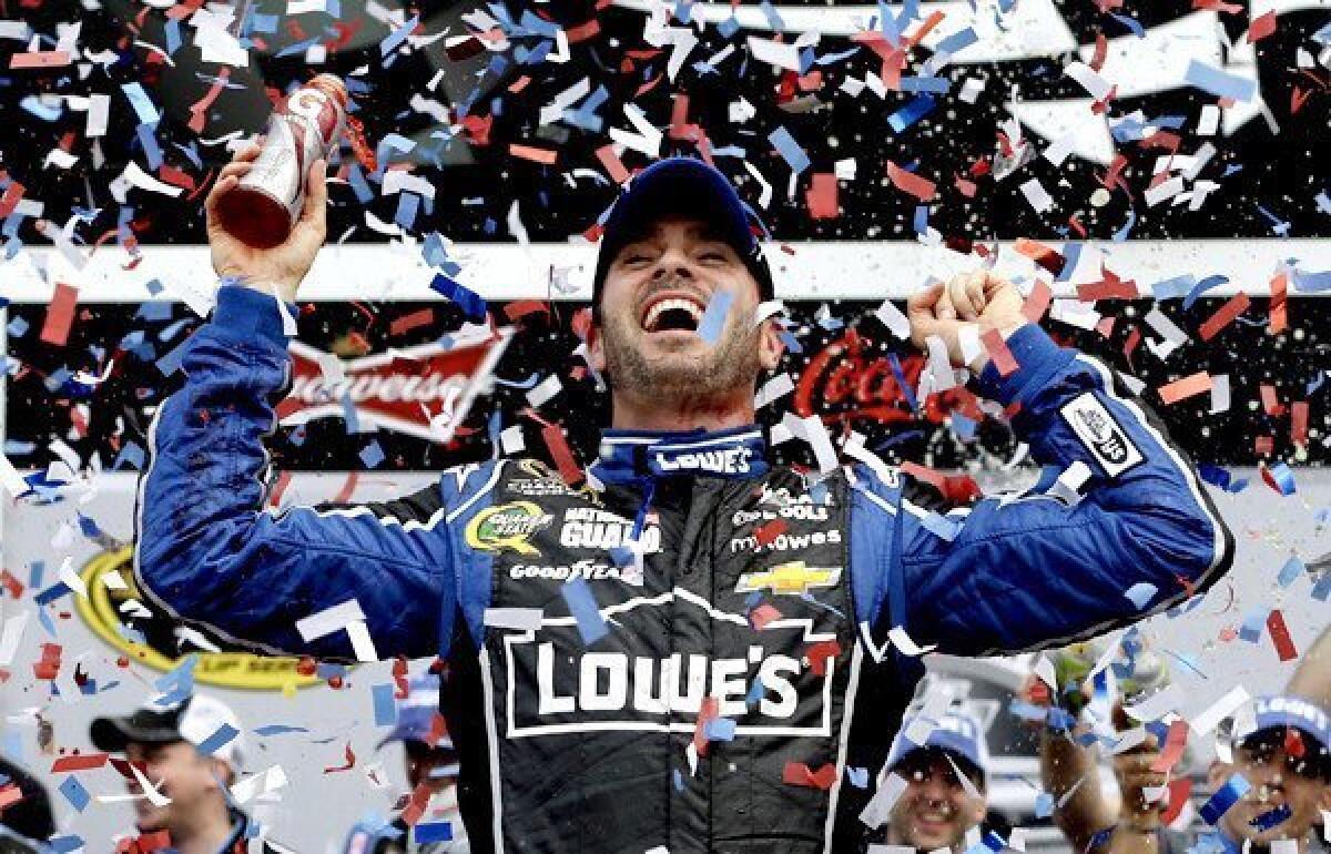 Jimmie Johnson celebrates his Daytona 500 victory on Sunday at Daytona International Speedway.