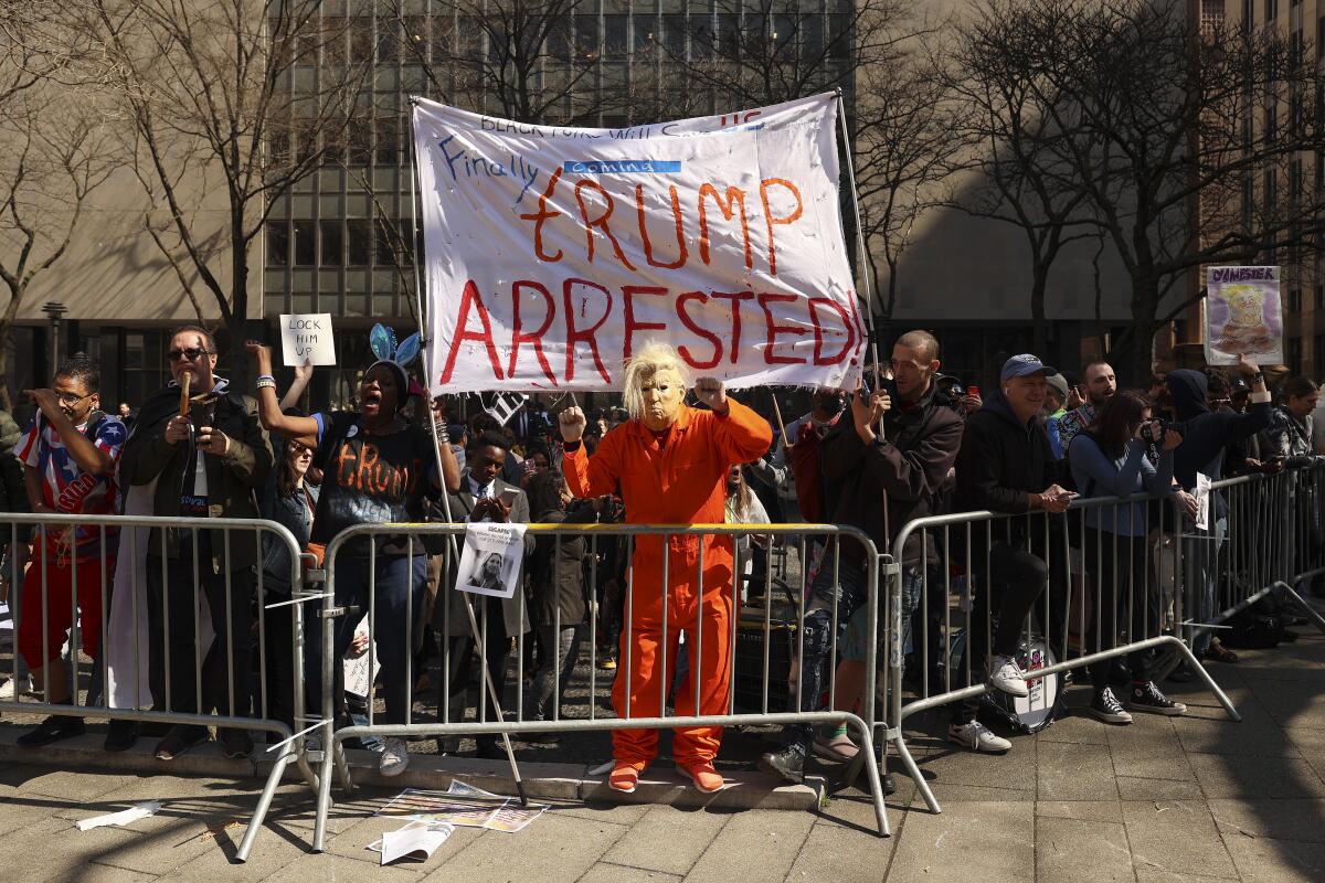 Demonstrators gather outside New York criminal court