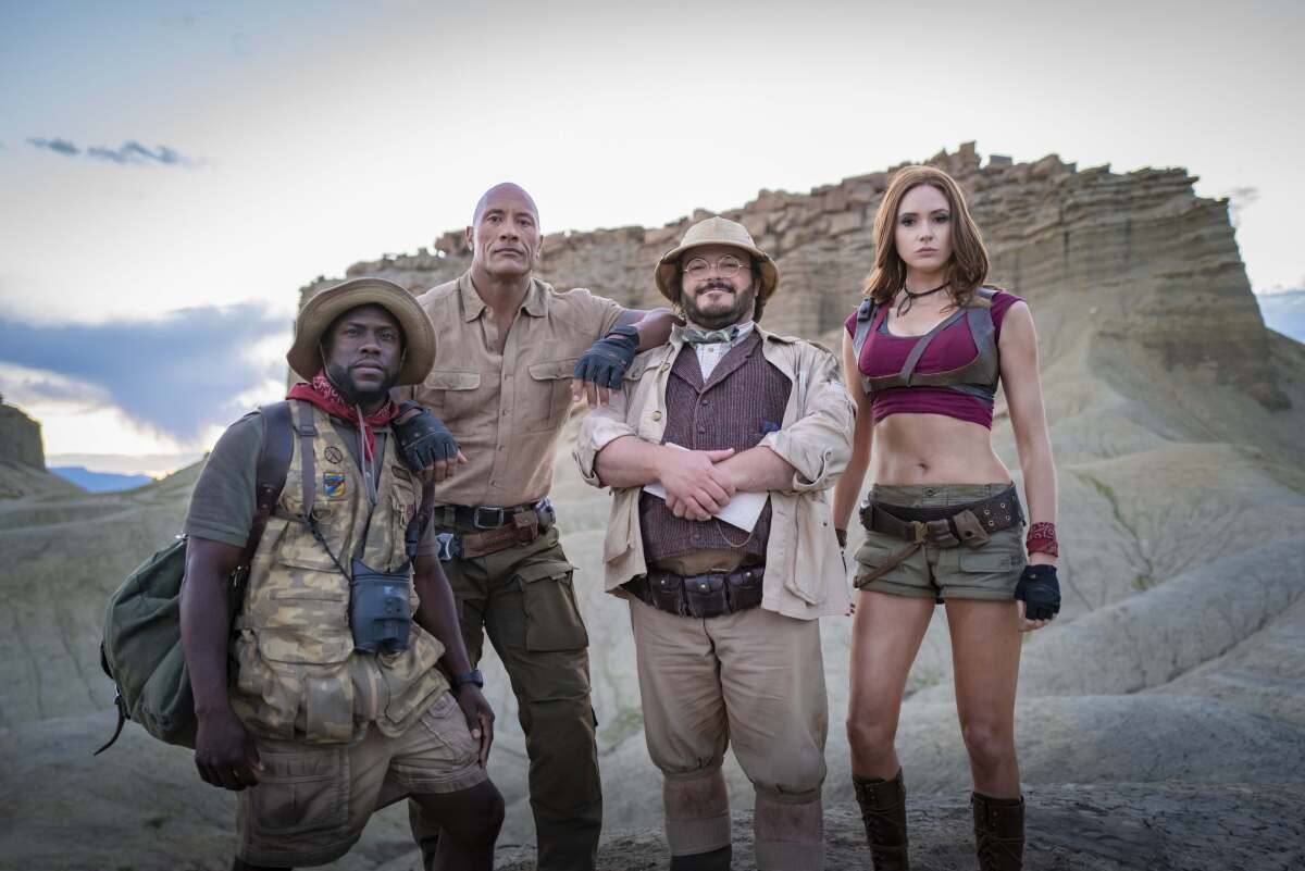 Kevin Hart, from left, Dwayne Johnson, Jack Black and Karen Gillan in 'Jumanji: The Next Level'
