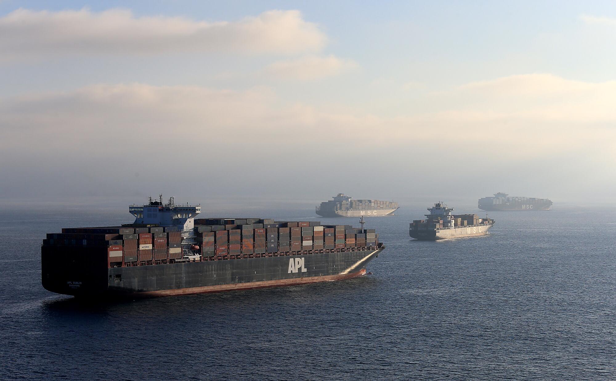 Cargo ships anchor off the ports of Los Angeles and Long Beach.
