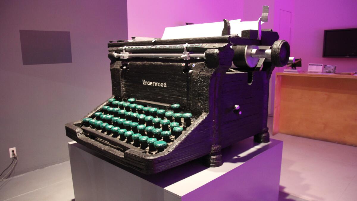 Youd creates sculptures of the typewriters different novelists have worked on — such as this cardboard rendering of the Underwood Rechy used.