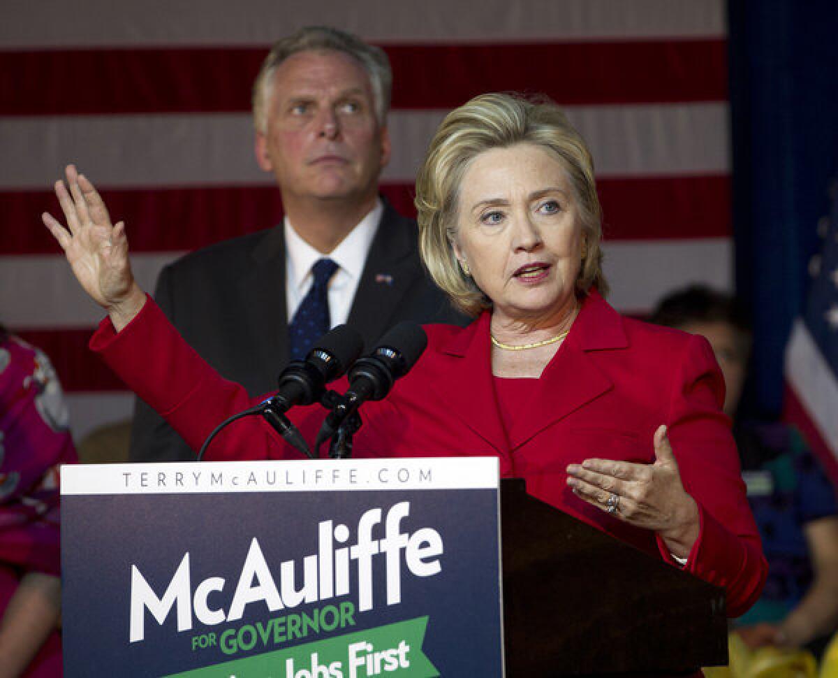 Former Secretary of State Hillary Clinton speaks at a campaign rally for Virginia gubernatorial candidate Terry McAuliffe in Falls Church, Va.