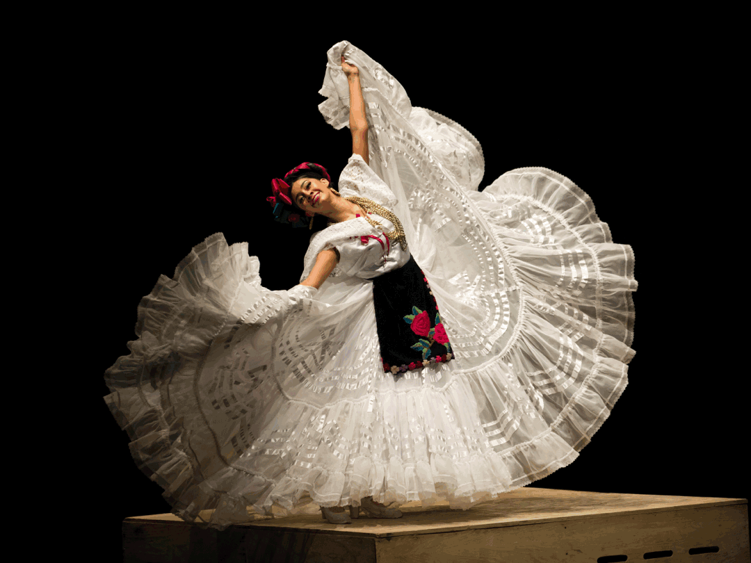 A slide show features a ballet folklórico dancer in a flowing dress, two actors on a bench and a woman sitting at a piano