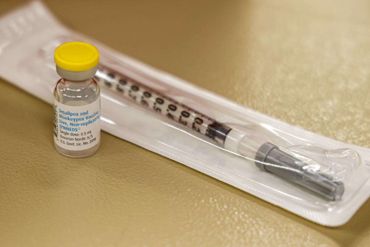 FILE - A vial containing the monkeypox vaccine and a syringe is set on the table at a vaccination clinic run by the Mecklenburg County Public Health Department in Charlotte, N.C., Saturday, Aug. 20, 2022. In the wake of a study released on Thursday, Sept. 8, 2022, U.S. officials are considering broadening recommendations for who gets vaccinated against monkeypox, possibly to include many men being treated for HIV or those who recently had other sexually transmitted infections. (AP Photo/Nell Redmond, File)