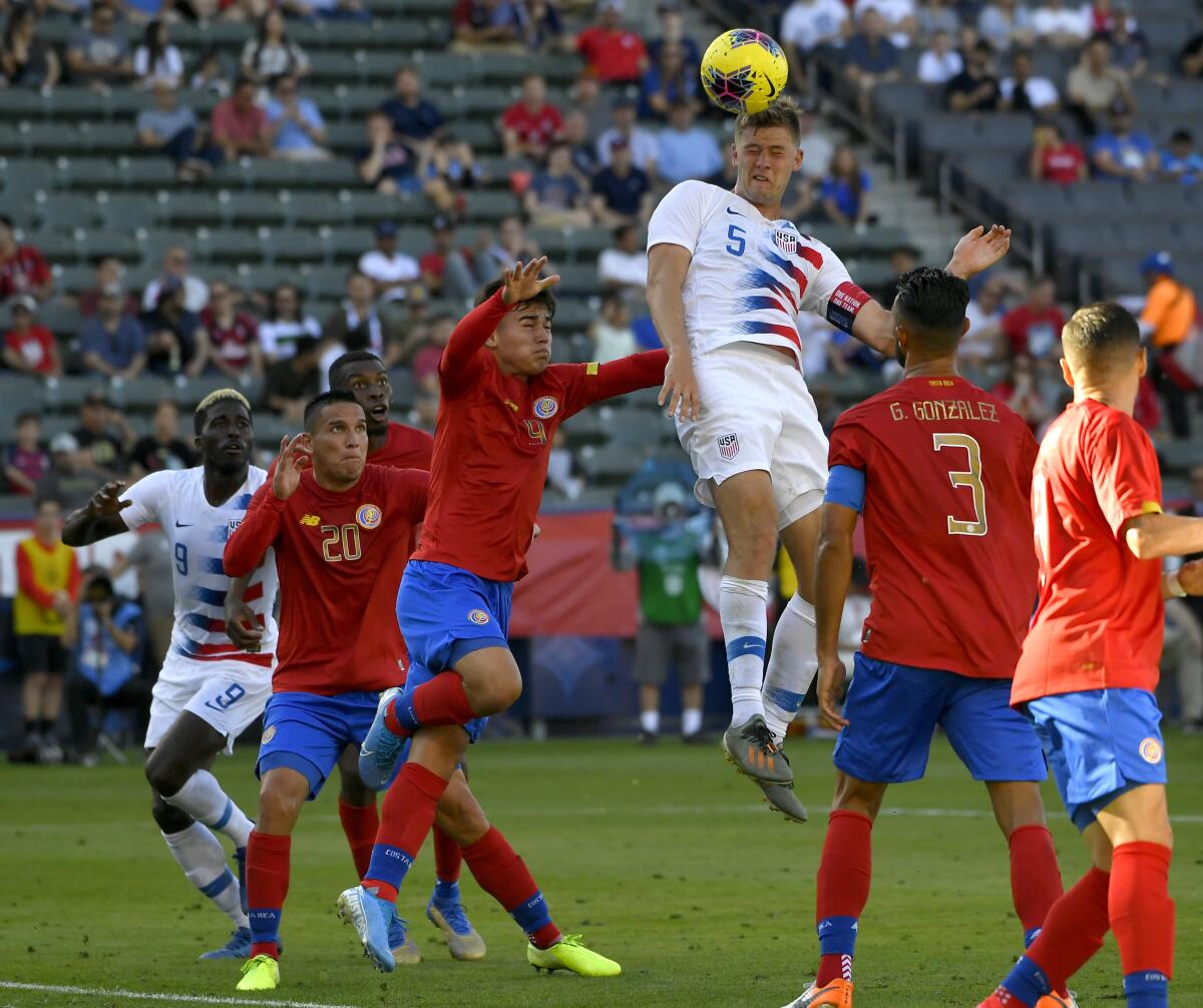 Walker Zimmerman of the United States heads the ball toward the goal during an exhibition match against Costa Rica on Feb. 1 at Dignity Health Sports Park.