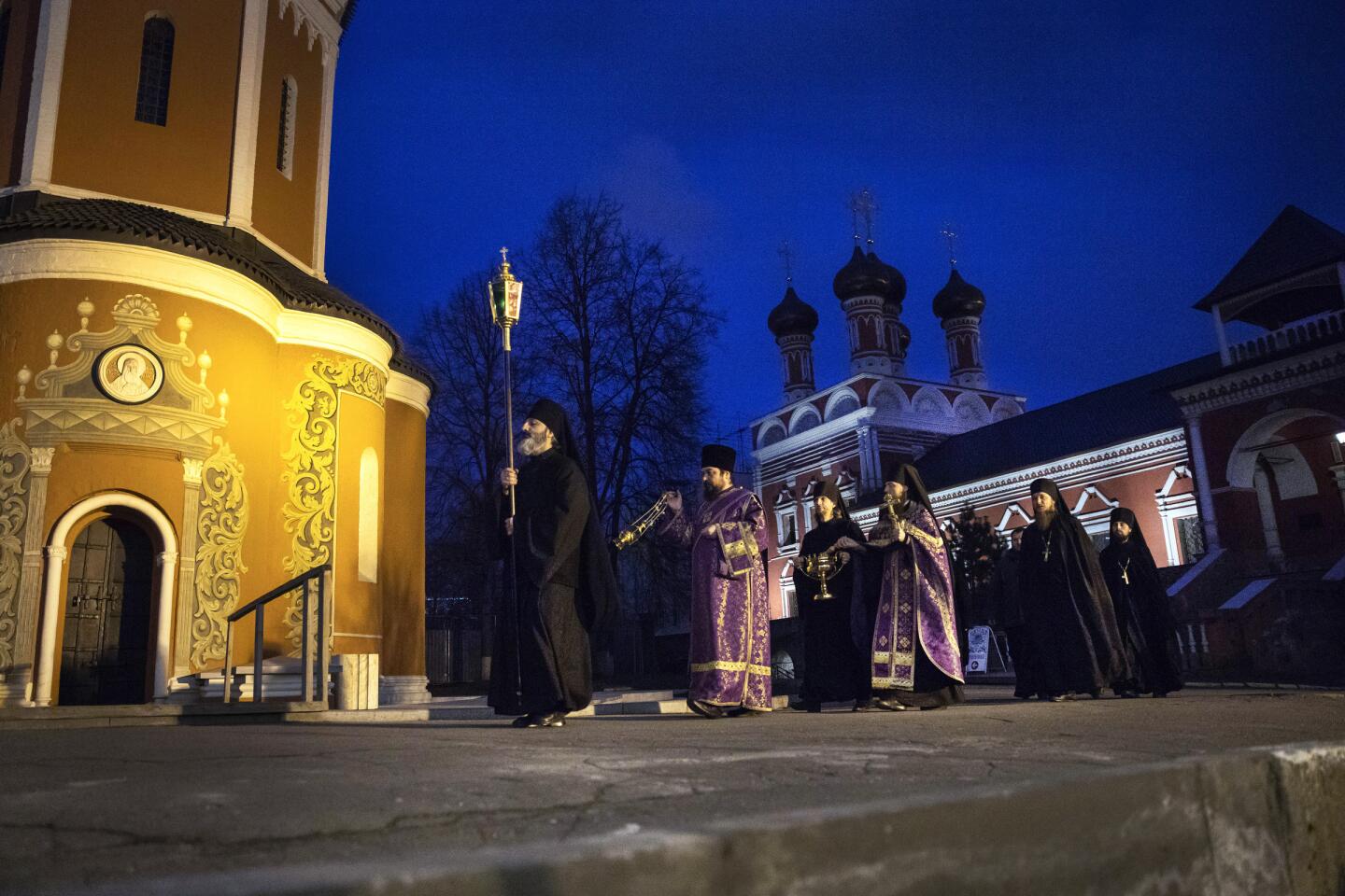 Russia: Russian Orthodox priests deliver a religious service for deliverance from the coronavirus at the St. Peter Monastery in the center of Moscow.