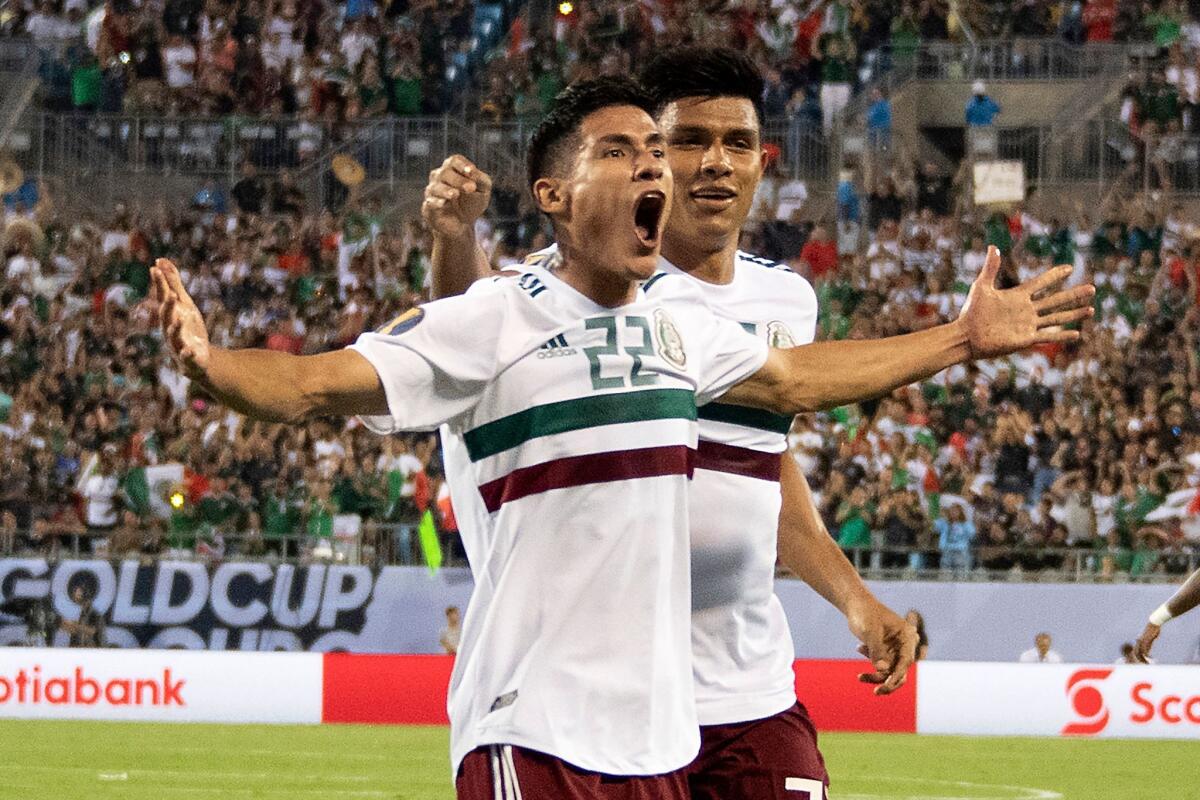 Mexico's Uriel Antuna (C) celebrates after scoring against Martinique during their CONCACAF Gold Cup group stage football match at Bank of America Stadium in Charlotte, North Carolina, on June 23, 2019.