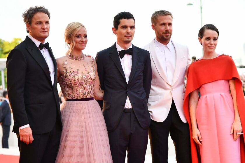 Jason Clarke, actress Olivia Hamilton, director Damien Chazelle, actor Ryan Gosling and actress Claire Foy pose as they arrive for the opening ceremony and the premiere of the film "First Man", presented in competition at the 75th Venice Film Festival on August 29, 2018 at Venice Lido.