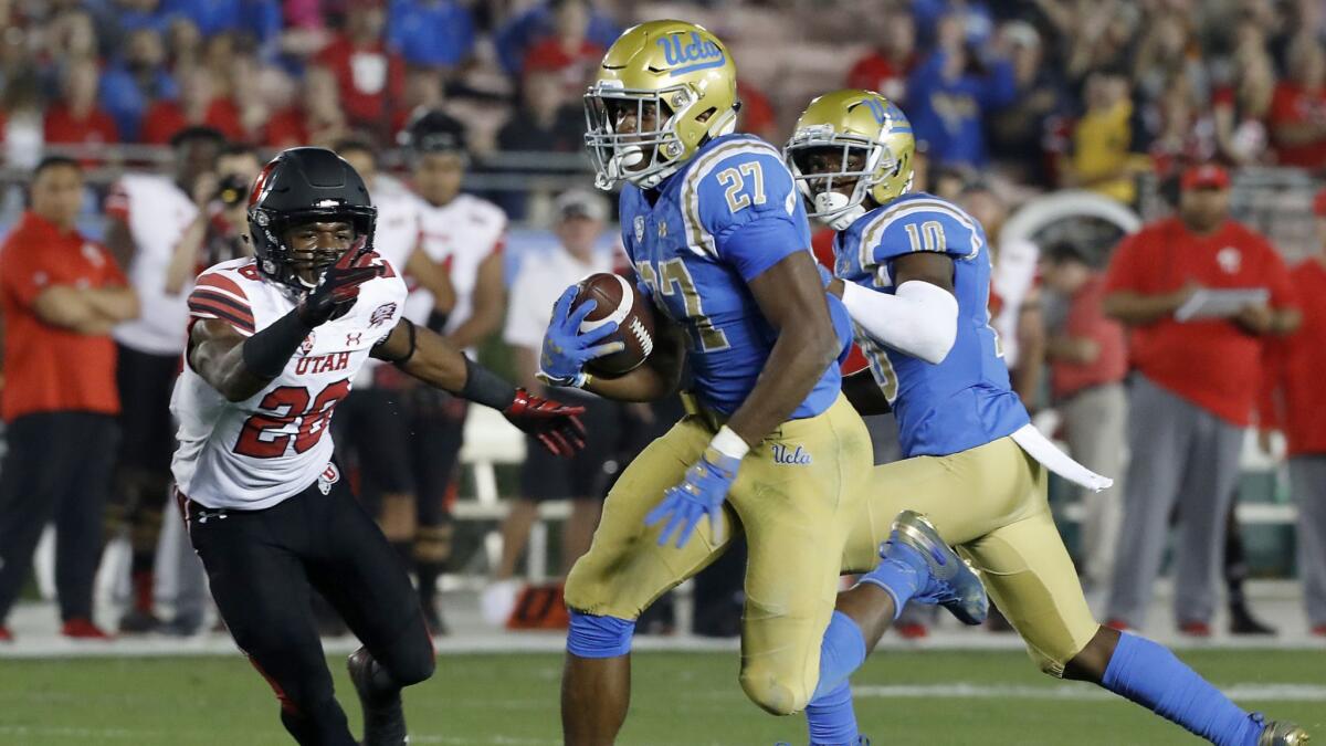 UCLA running back Joshua Kelley breaks free for a touchdown against Utah.