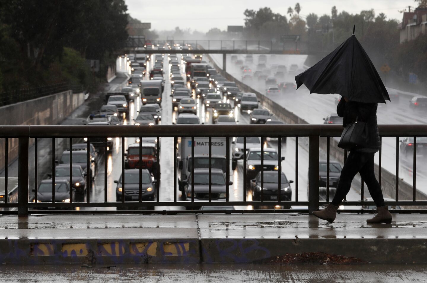 Rain-soaked 101 traffic at a crawl