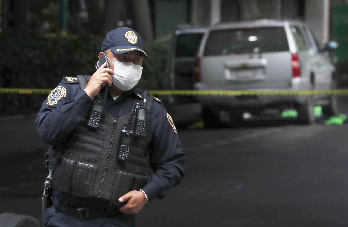 An abandoned vehicle that is believed to have been used by gunmen in an attack against Mexico City's police chief.