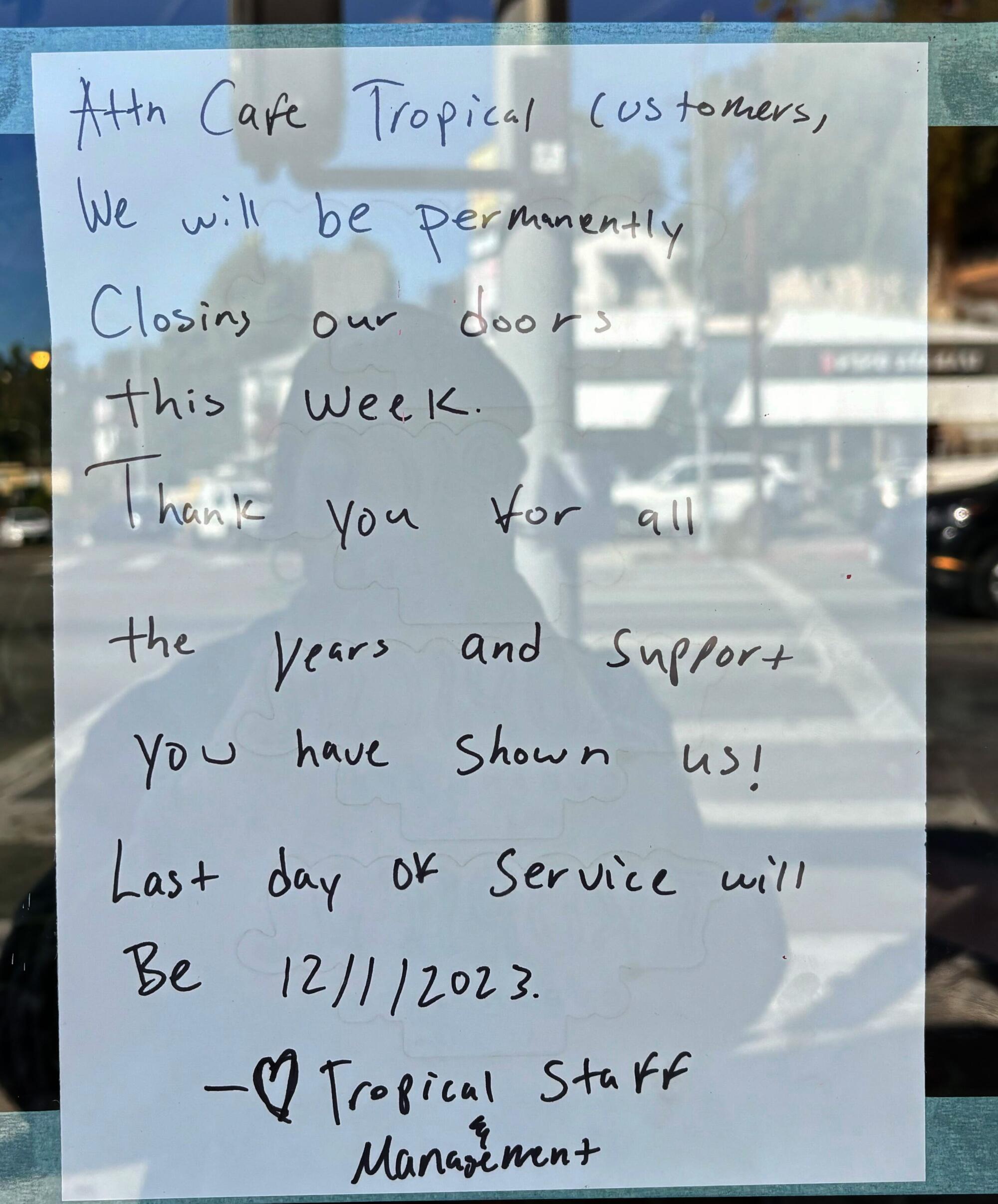 A hand-written sign at Cafe Tropical 