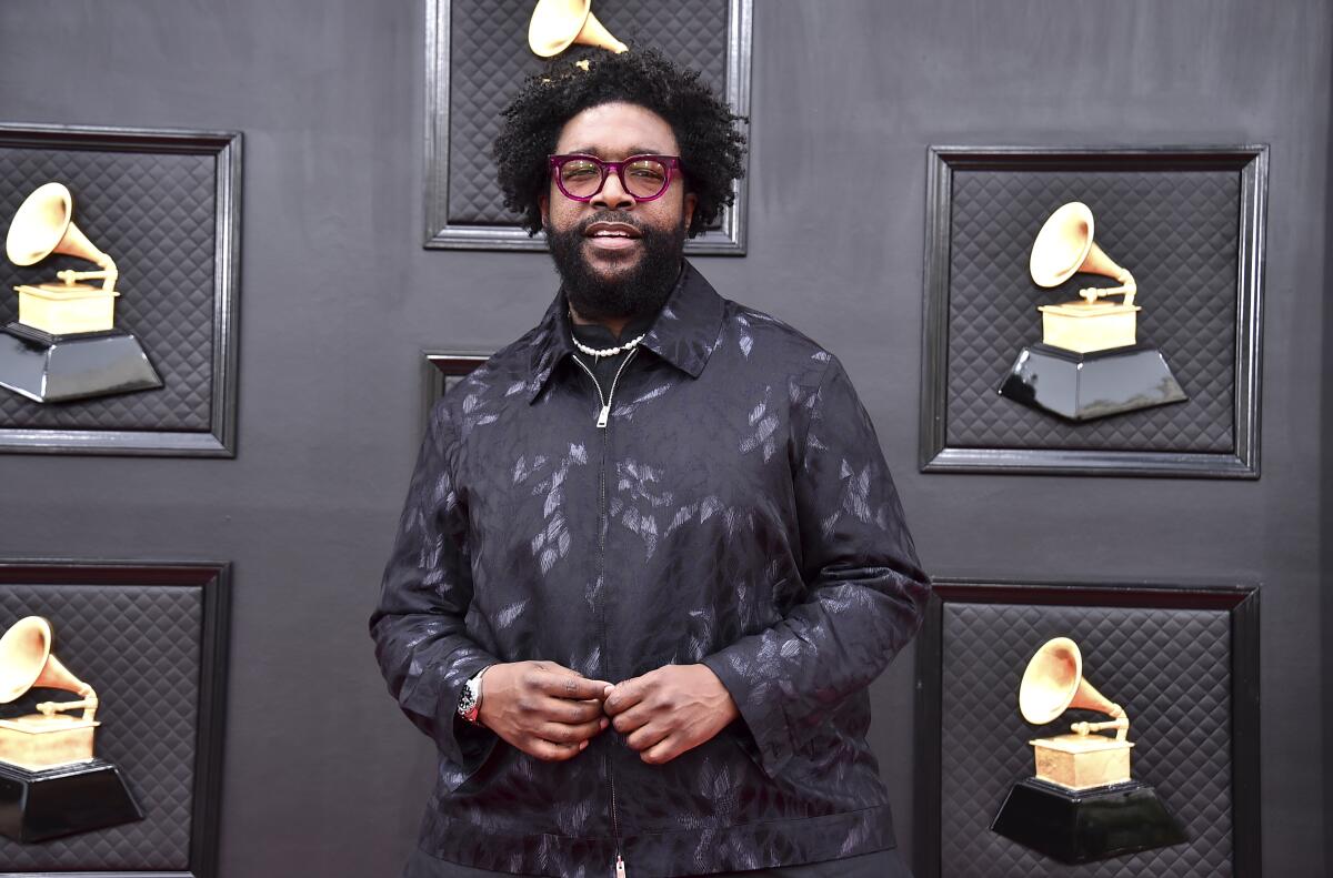 Questlove arrives at the 64th Grammy Awards.