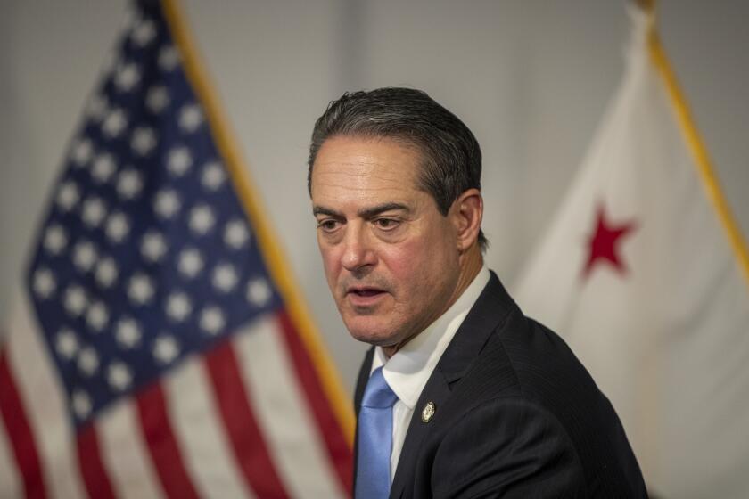 Santa Ana, - May 17: Orange County District Attorney Todd Spitzer speaks to reporters after announcing that he filed a murder charge against David Wenwei Chou, 68, of Las Vegas, that could carry the death penalty at the Orange County District Attorney's office in the Santa Ana Tuesday, May 17, 2022. Chou is accused of fatally shooting one man and wounding five other people at the Irvine Taiwanese Presbyterian Church, which rents space at Geneva Presbyterian Church in Laguna Woods. in what authorities have characterized as an apparent political hate crime. In addition to the murder charge, Chou faces five counts of attempted murder as well as murder with the special circumstance of the use of a gun and lying in wait, Dist. Atty. Todd Spitzer said. The special circumstances enhancement means that if convicted, Chou would face life in prison without parole or the death penalty. Chou was also charged with four counts of possession of destructive devices with intention to kill or harm. (Allen J. Schaben / Los Angeles Times)