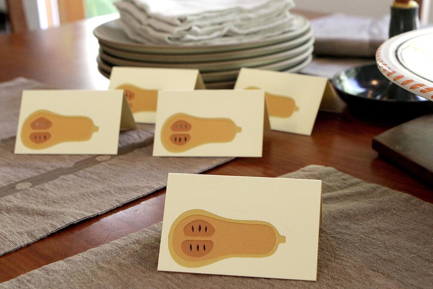 Los Angeles paper artist Anna Bondoc agreed to walk readers through the steps of making these squash place cards, one of the projects featured in her new book, "Simply Paper Cutting: Hand-Cut Paper Projects for Home Decor, Stationery & Gifts." We've even provided templates to make the job easier ...