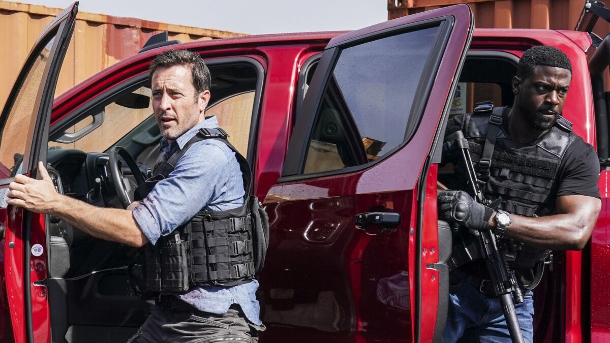 Alex O'Loughlin, left, and Lance Gross in the series finale of the police drama "Hawaii Five-0" on CBS.