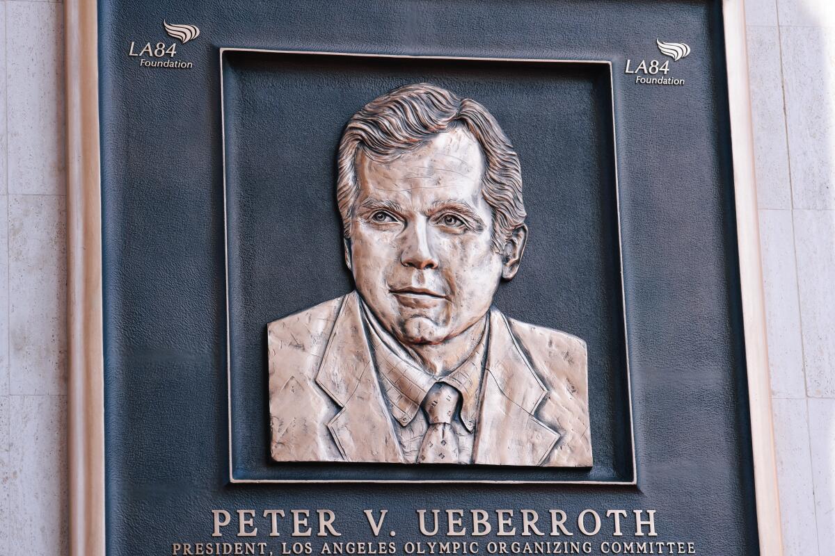 A plaque is unveiled during an event to honor 1984 Los Angeles Olympic Organizing Committee President Peter V. Ueberroth.