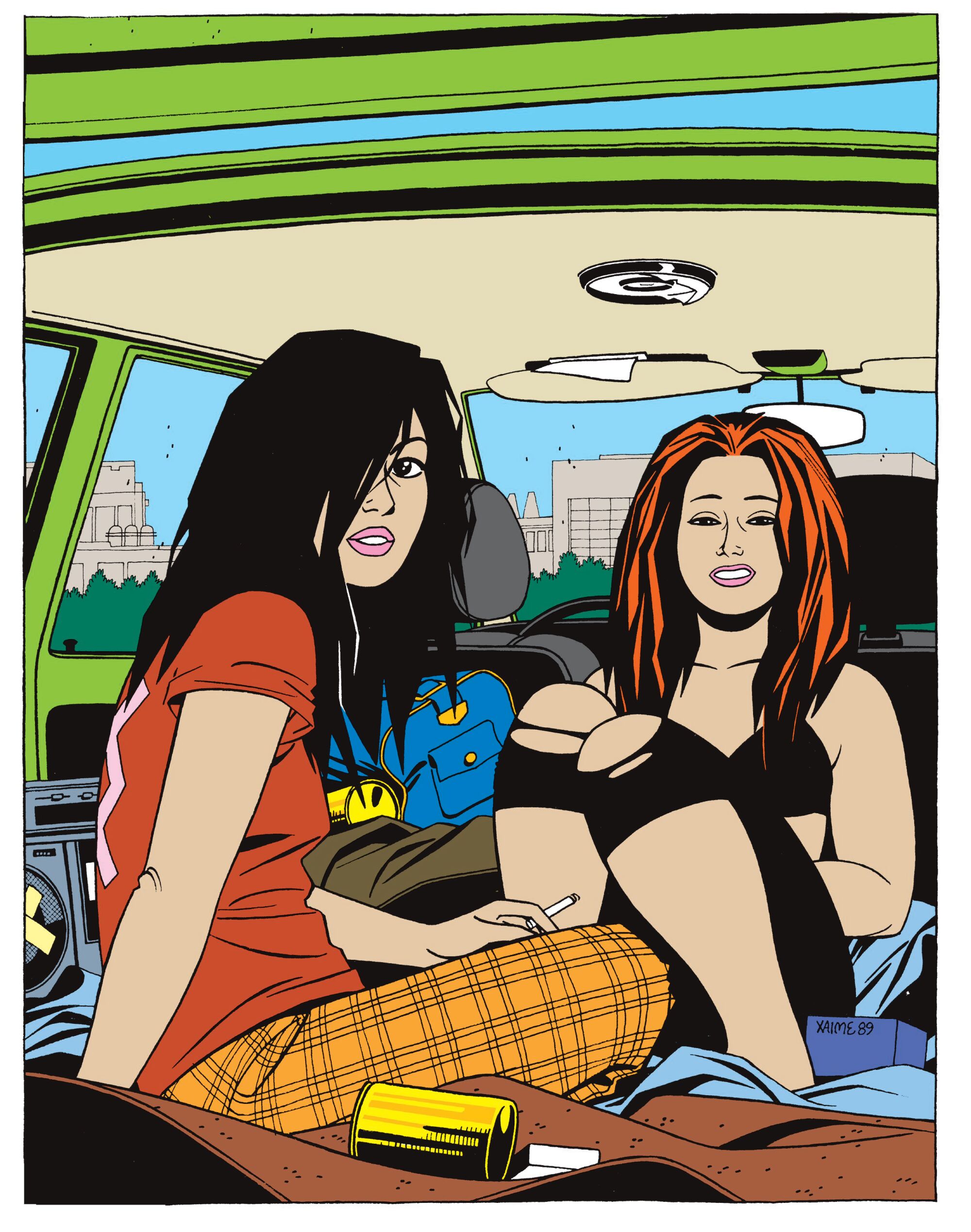 An illustration shows "Love & Rockets" characters Hopey and Maggie dressed like punk rockers sitting inside a car