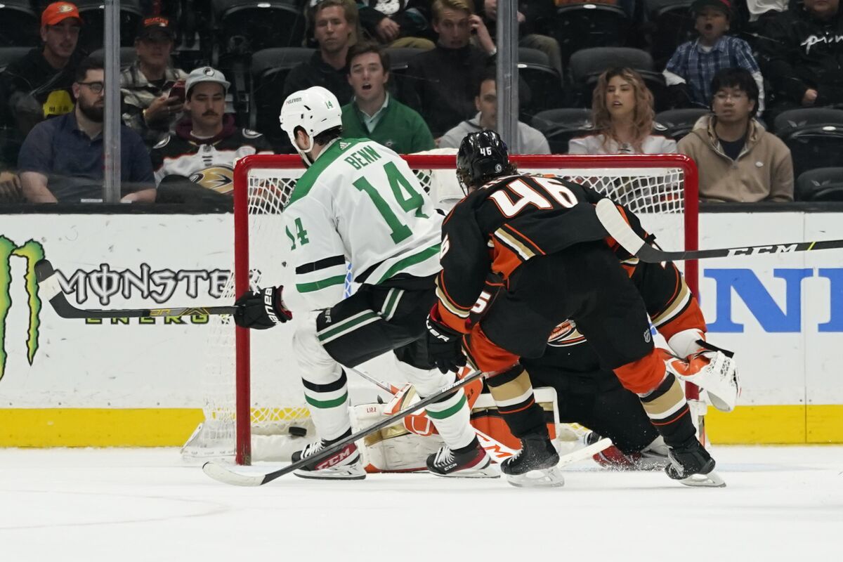Dallas Stars left wing Jamie Benn (14) scores during overtime of an NHL hockey game against the Anaheim Ducks in Anaheim, Calif., Thursday, March 31, 2022. The Stars won 3-2. (AP Photo/Ashley Landis)