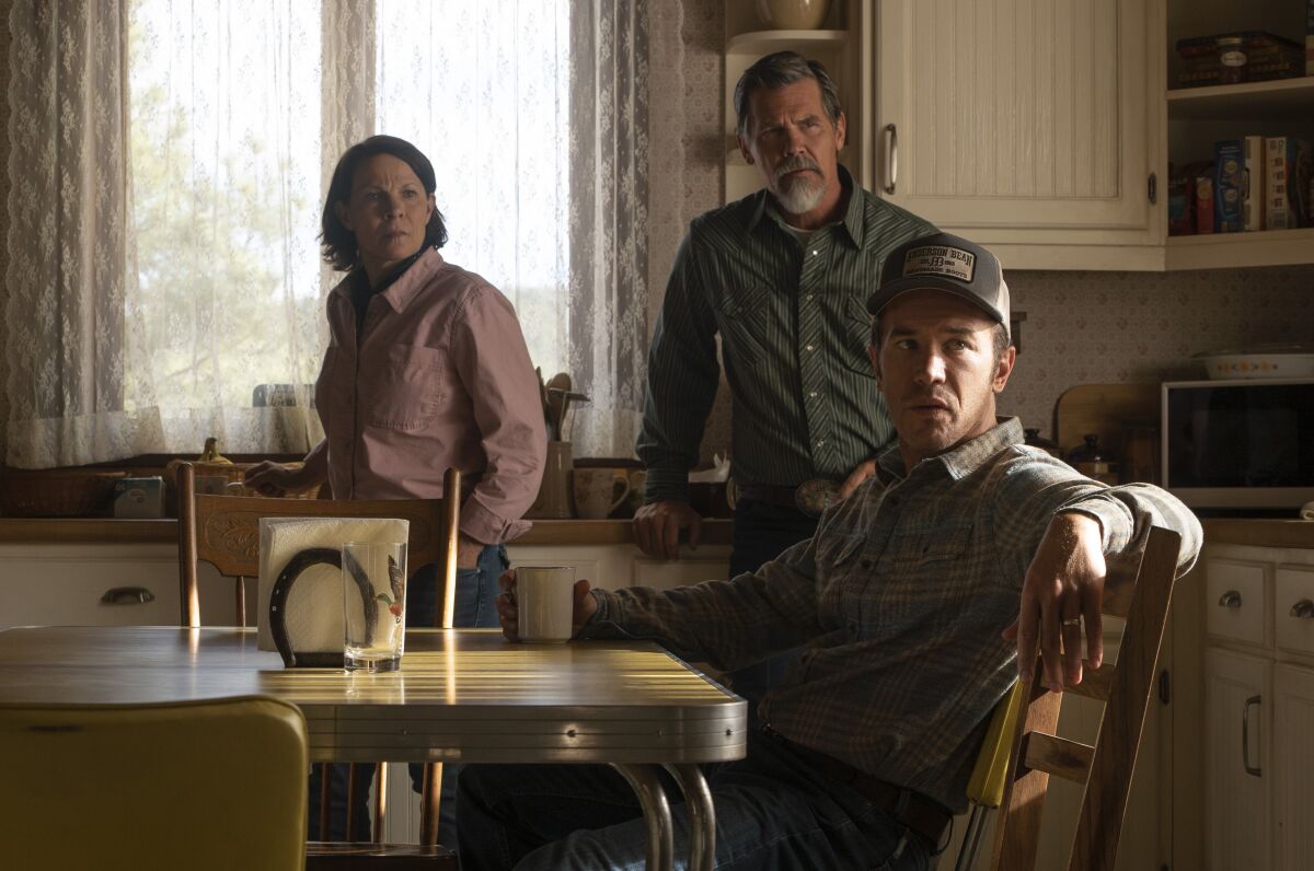 This image released by Amazon Prime Video shows, from left, Lili Taylor, Josh Brolin and Tom Pelphrey in a scene from "Outer Range," a modern Western with supernatural elements. The series debuts Friday on Amazon's Prime Video streaming service. (Richard Foreman/Amazon Prime Video via AP)