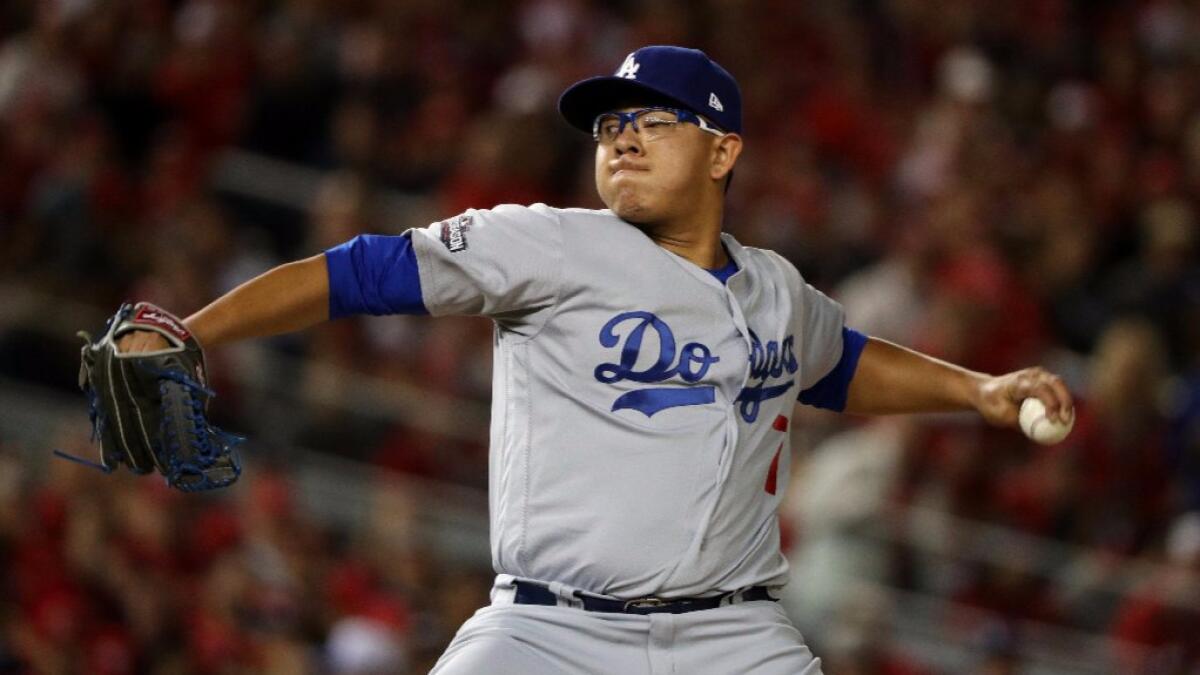 Dodgers left-hander Julio Urias pitches against the Nationals during Game 5 of the National League division series on Oct. 13.