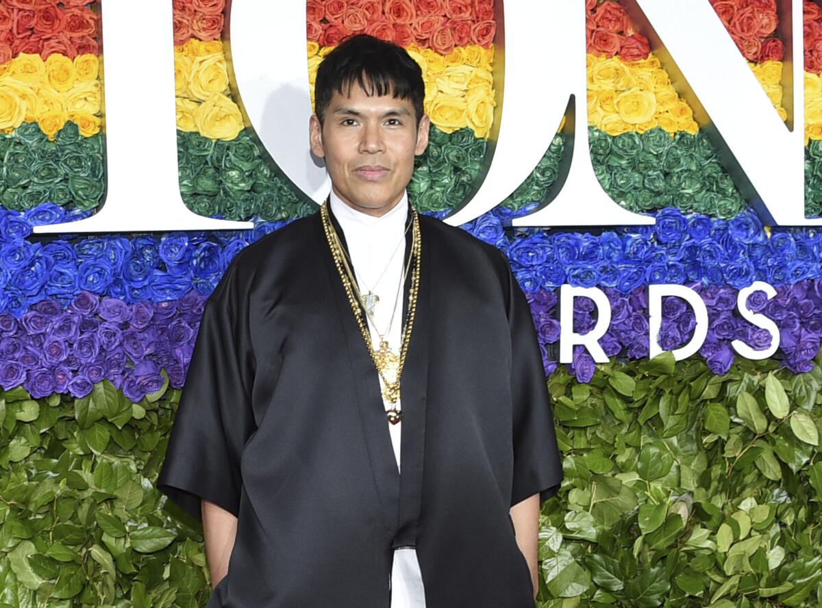 FILE - Set designer Clint Ramos arrives at the 73rd annual Tony Awards in New York on June 9, 2019. For his striking scenic design in "Slave Play," Ramos has earned a 2021 Tony Award nominations. He also received a nod for best costume design for “The Rose Tattoo.” (Photo by Evan Agostini/Invision/AP, File)