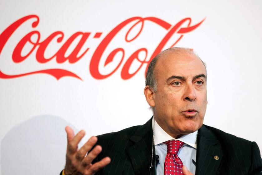Coca-Cola CEO Muhtar Kent speaks during a May 8, 2013, news conference in Atlanta.