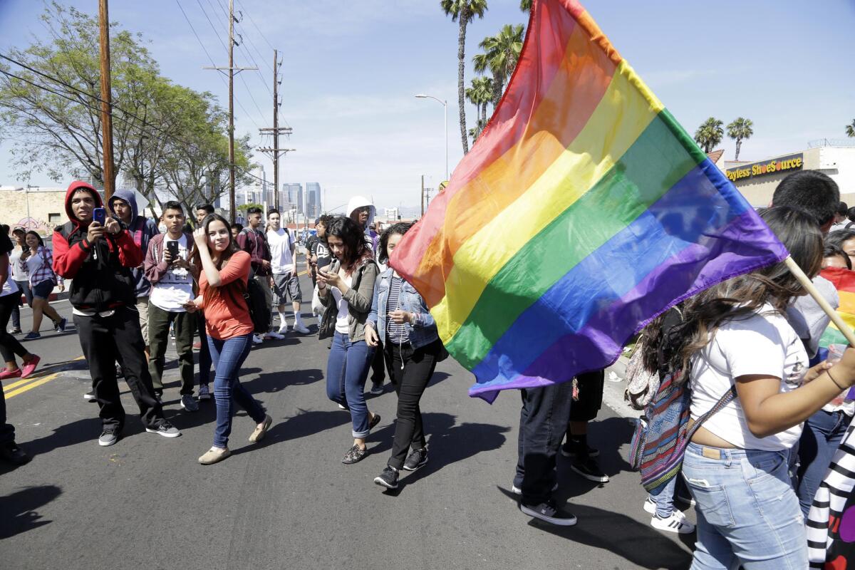Students rally outside Santee Education Complex in South Los Angeles on Wednesday in support of the school's gender-neutral bathroom and the students who advocated for it. Some students had fought with protesters outside the school Tuesday.