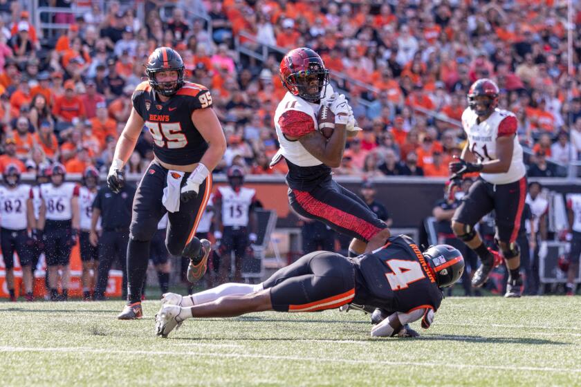 CORVALLIS, OREGON - SEPTEMBER 16: Wide receiver Brionne Penny #11 of the San Diego State Aztecs catches a pass against defensive back Jaden Robinson #4 of the Oregon State Beavers*during the second half at Reser Stadium on September 16, 2023 in Corvallis, Oregon. (Photo by Tom Hauck/Getty Images)