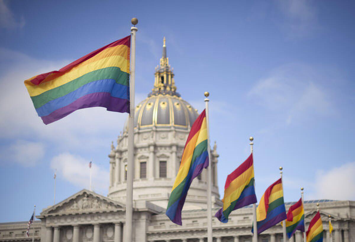 The U.S. Supreme Court ruled that Proposition 8's proponents lacked legal standing to appeal a lower court decision declaring that measure unconstitutional, which is hardly a decisive national ruling in favor of marriage equality. Above: Rainbow flags fly in front of San Francisco City Hall shortly after the U.S. Supreme Court decision that cleared the way for same-sex marriage in the state.