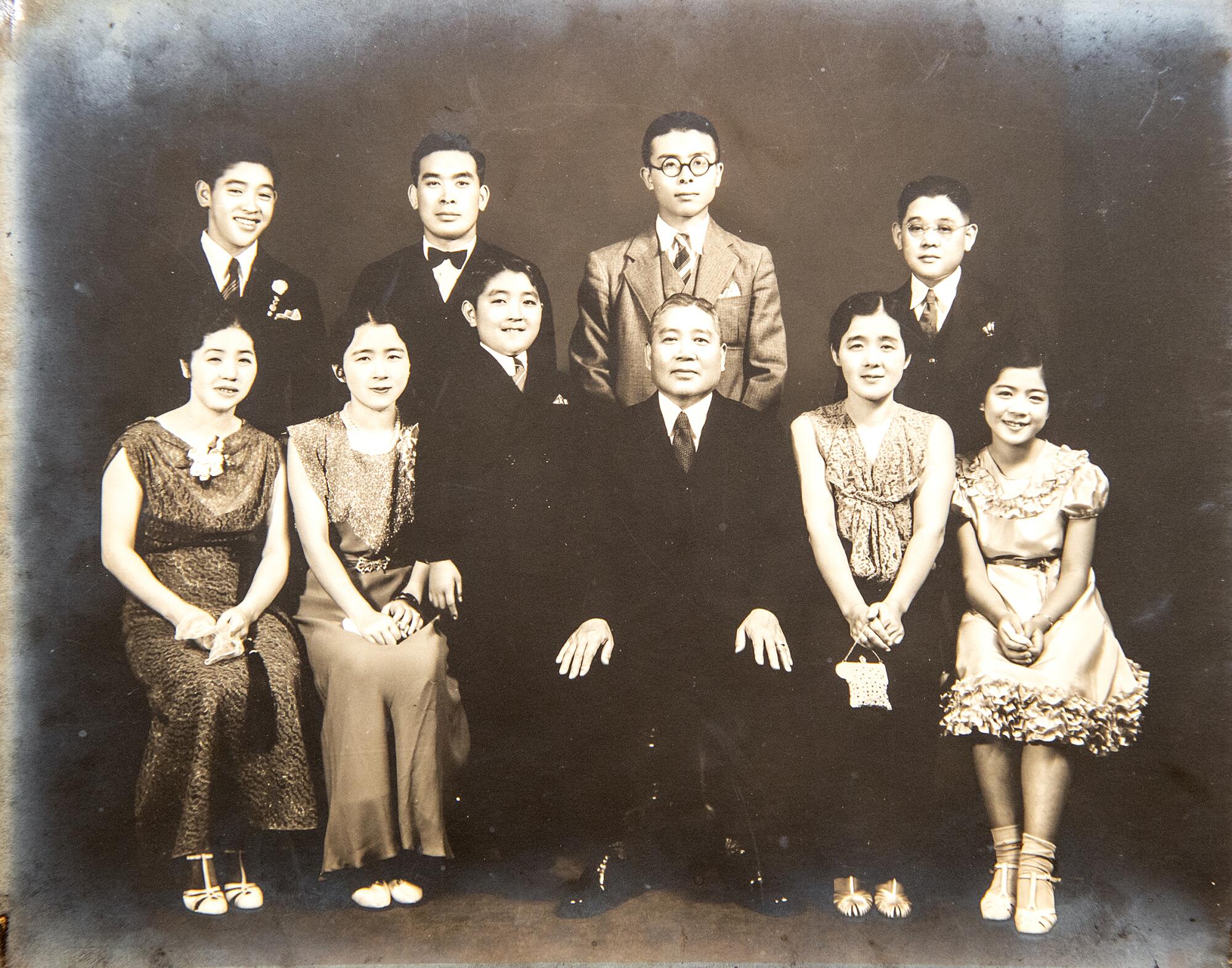 A family portrait including cousins Becky Kato Applegato and Takako Osumi as children. 