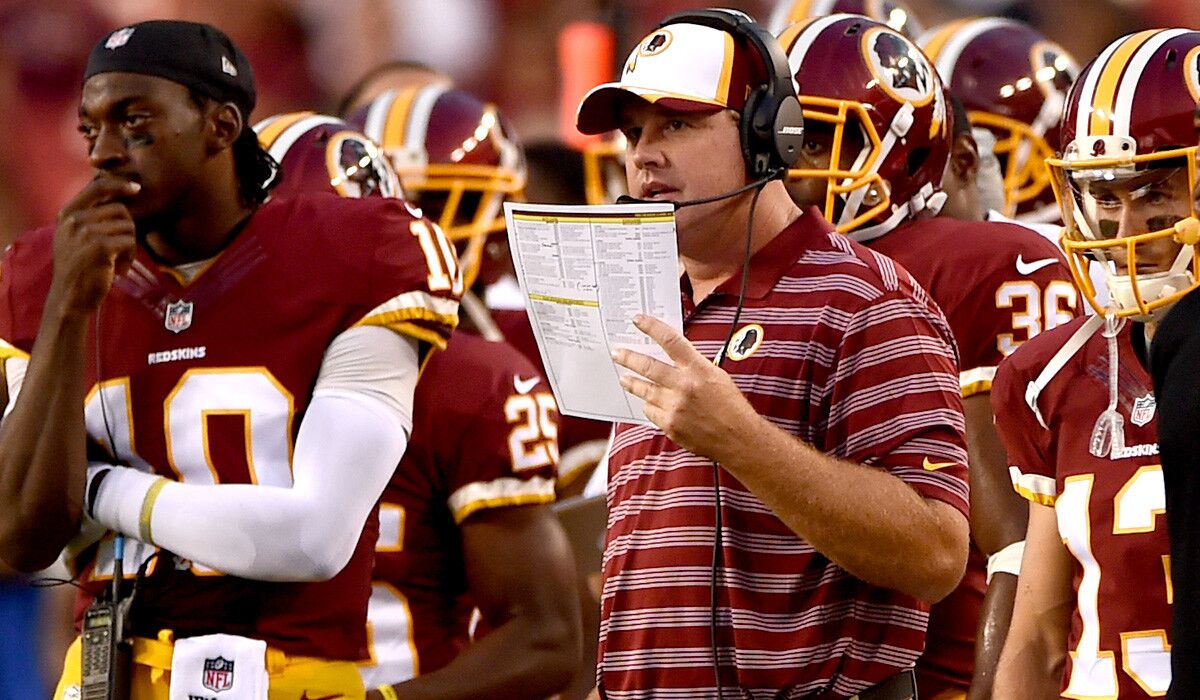 Redskins Coach Jay Gruden, with starting quarterback Robert Griffin III to his right, has been a successful coordinator who is running an NFL team for the first time.