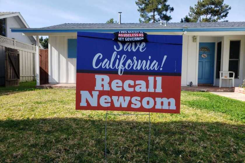 A sign to recall California Gov. Gavin Newsom in San Diego.