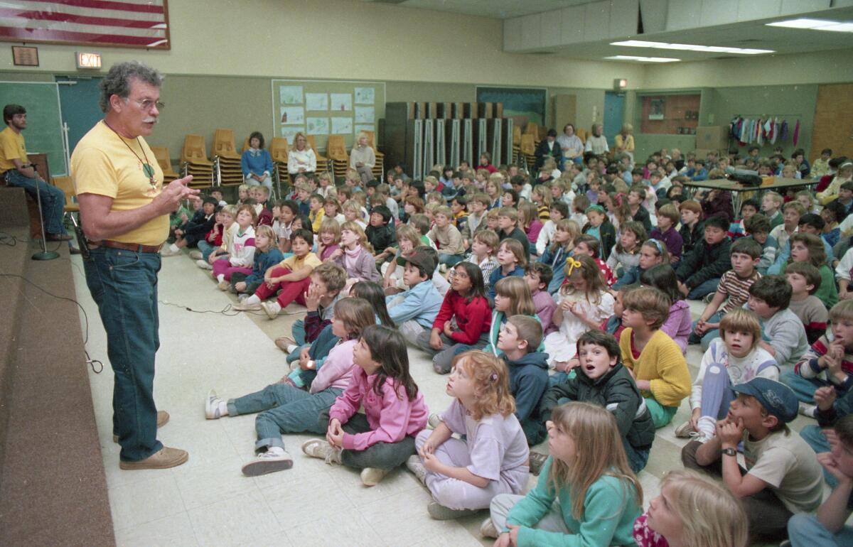 Ab Taylor talks to children