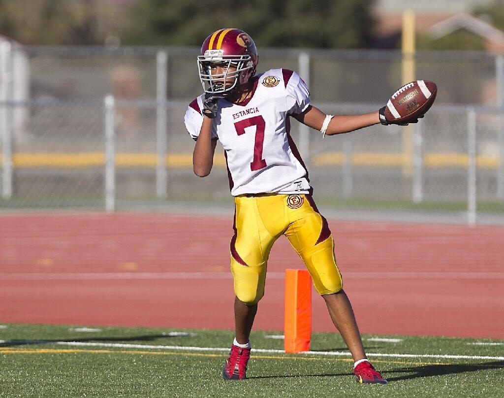 Estancia's Jaycen Cash stands in the end zone after a pass from Myles Witte for a touchdown against Costa Mesa.