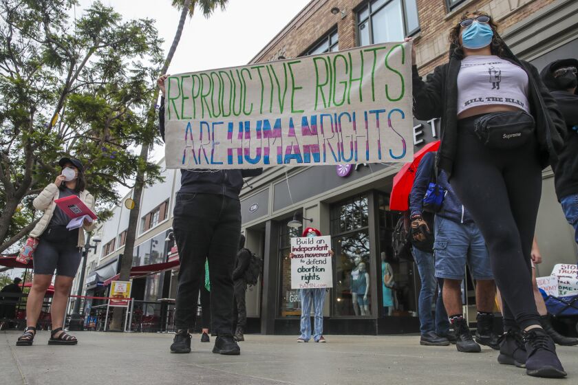 Santa Monica, CA - July 16: Abortion-rights supporters rally at Planned Parenthood-Santa Monica Health Center on Saturday, July 16, 2022 in Santa Monica, CA. (Irfan Khan / Los Angeles Times)