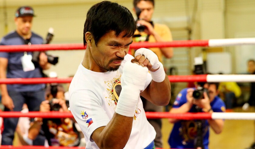 Manny Pacquiao, 40, shown here training for an earlier bout, takes on Keith Thurman, 30, in Las Vegas on Saturday. It will be Pacquiao's 71st professional fight.