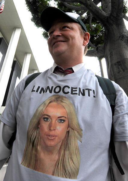 Lindsay Lohan fan wearing a 'Linnocent!' t-shirt is seen in front of the Beverly Hills Courthouse on July 20, 2010 in Beverly Hills, California.